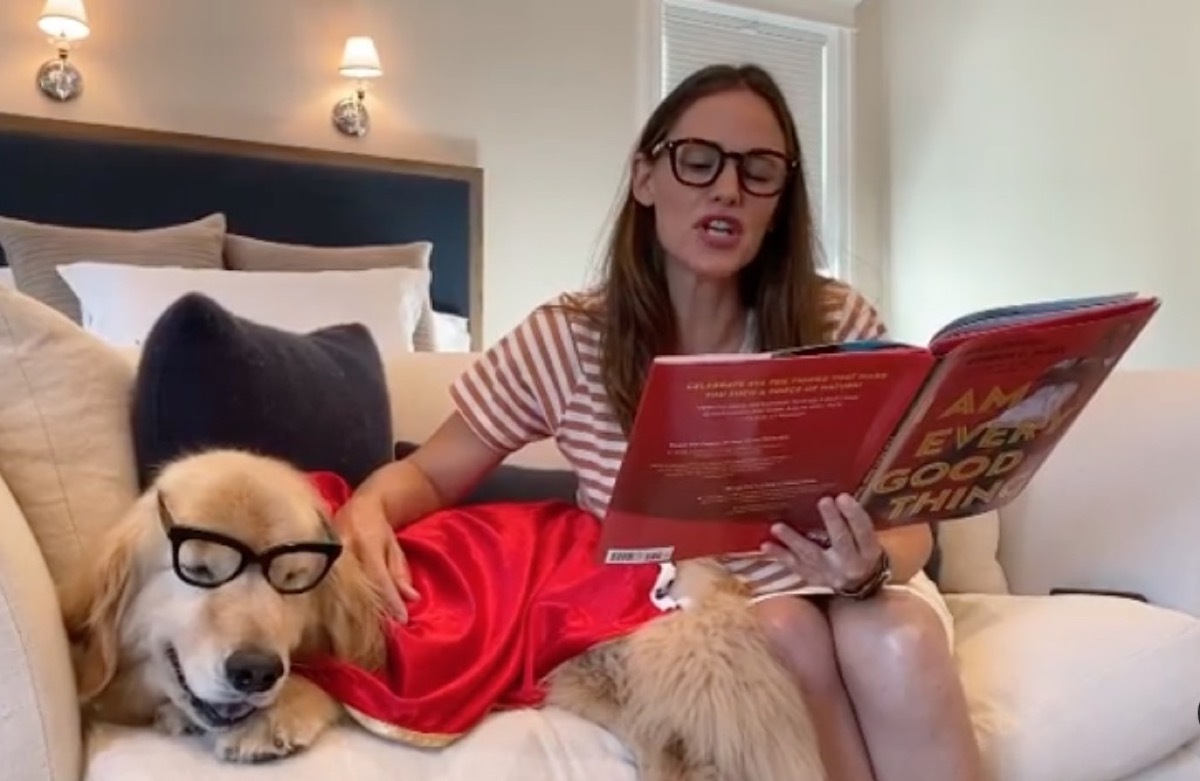 jennifer garner and her dog wearing glasses and dressed as superheroes