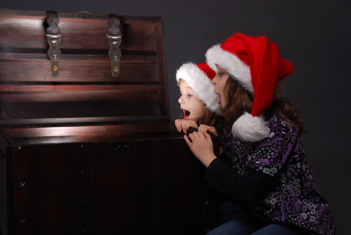 Little girls enjoying a Christmas treasure hunt