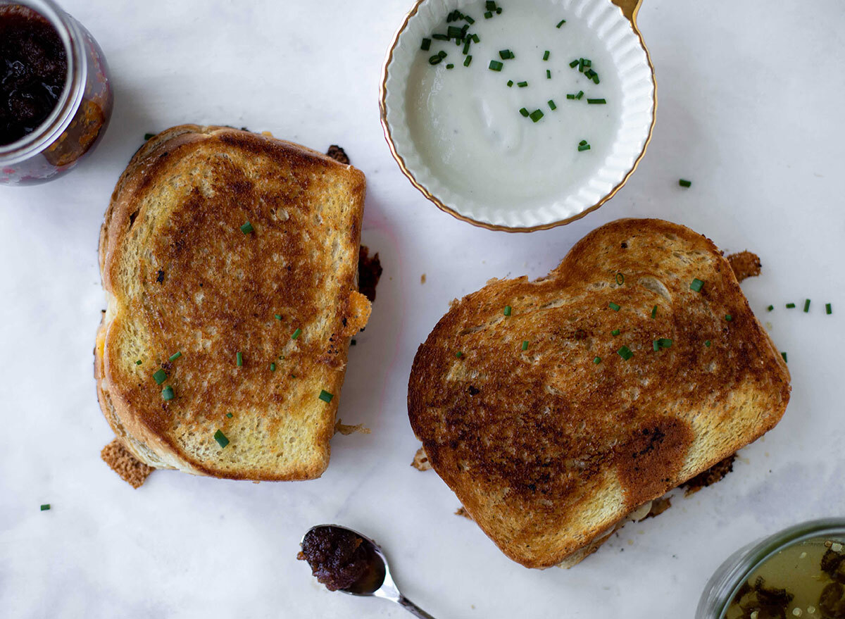 bacon grilled cheese with dip on marble board