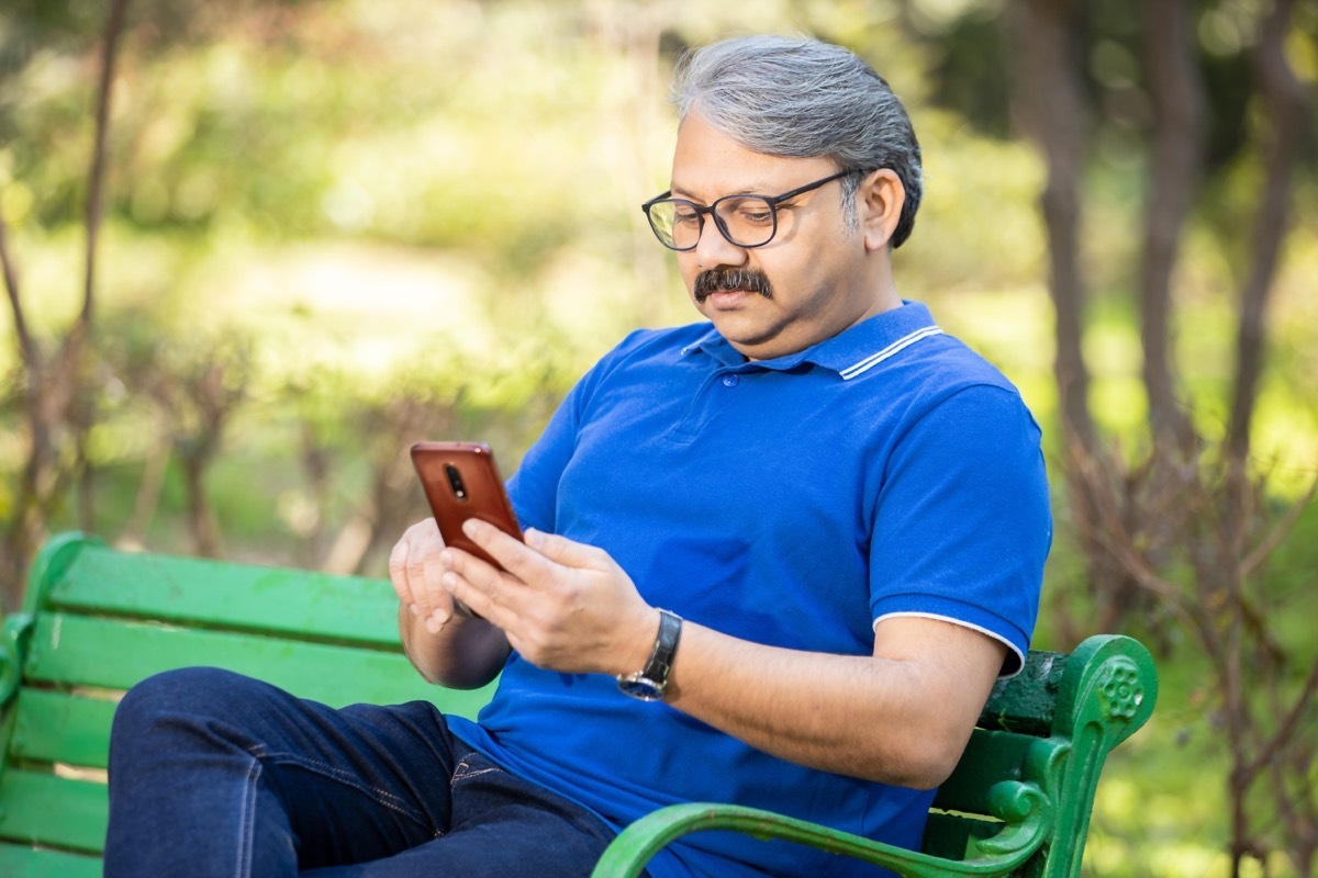 senior man using android smartphone