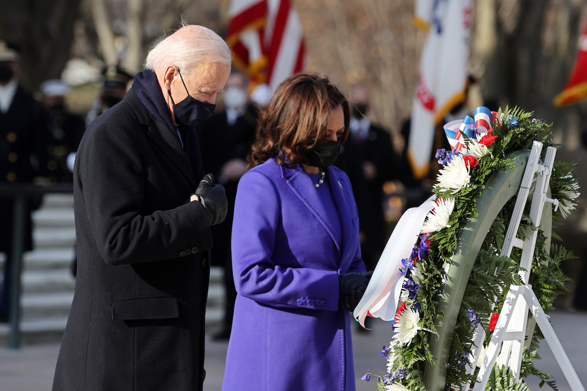 President Joe Biden and Vice President Kamala Harris attend a wreath-laying ceremony at Arlington National Cemetery's Tomb of the Unknown Soldier after Presidential Inauguration ceremony at the U.S. Capitol January 20, 2021 in Arlington, Virginia