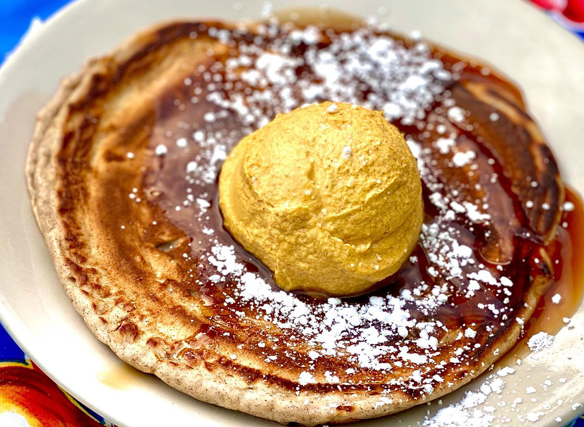 cinnamon pancakes with powdered sugar and butter