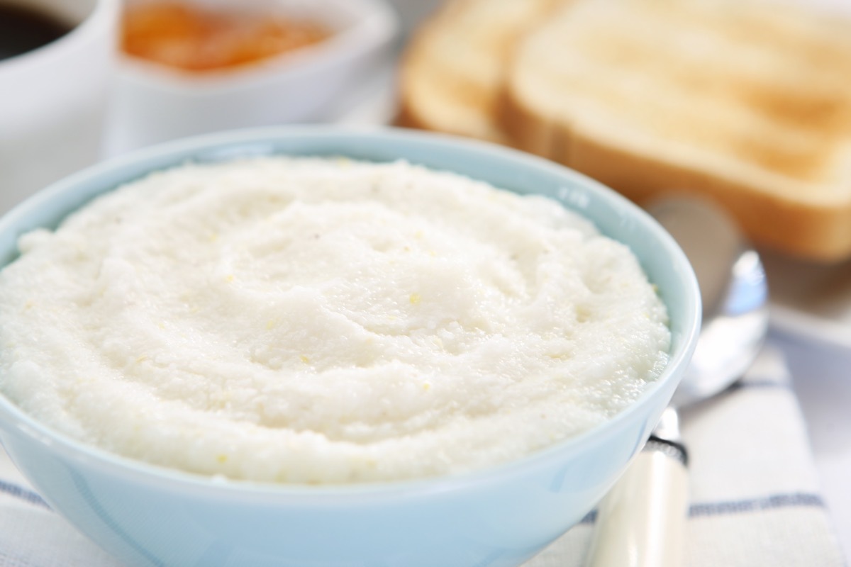 bowl of breakfast grits sitting on a table