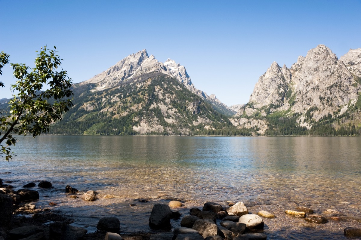 Teton Range huddles agains Jenny Lake at Grand Teton National Park, Wyoming