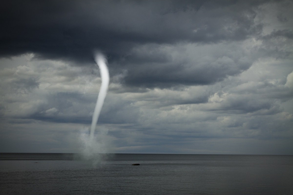 Bad weather and the storm with the wind on the sea. tornado over the ocean