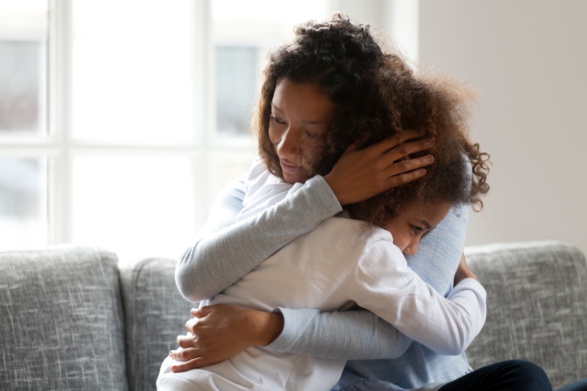 mom hugging child