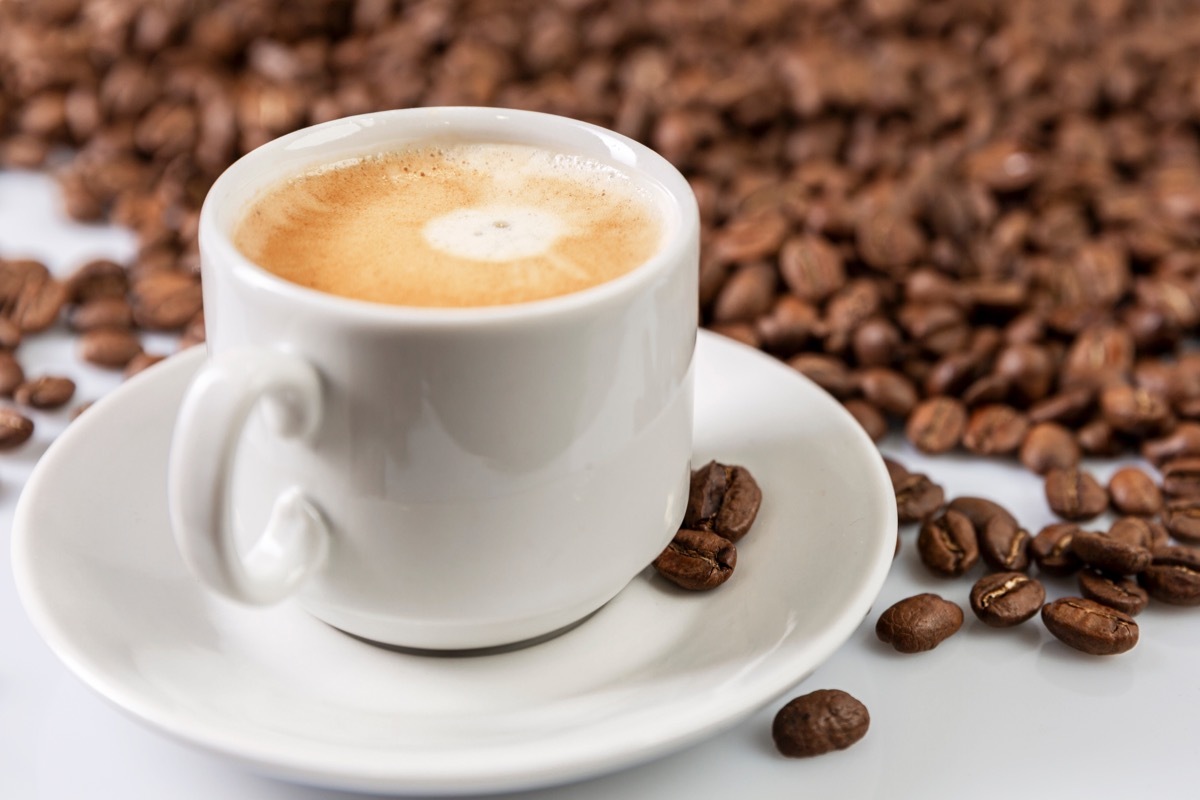 espresso cup with coffee beans