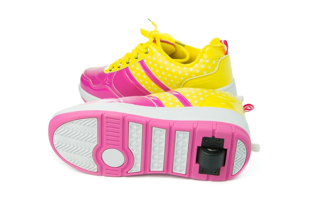 Pair of pink heelys on white background - Image