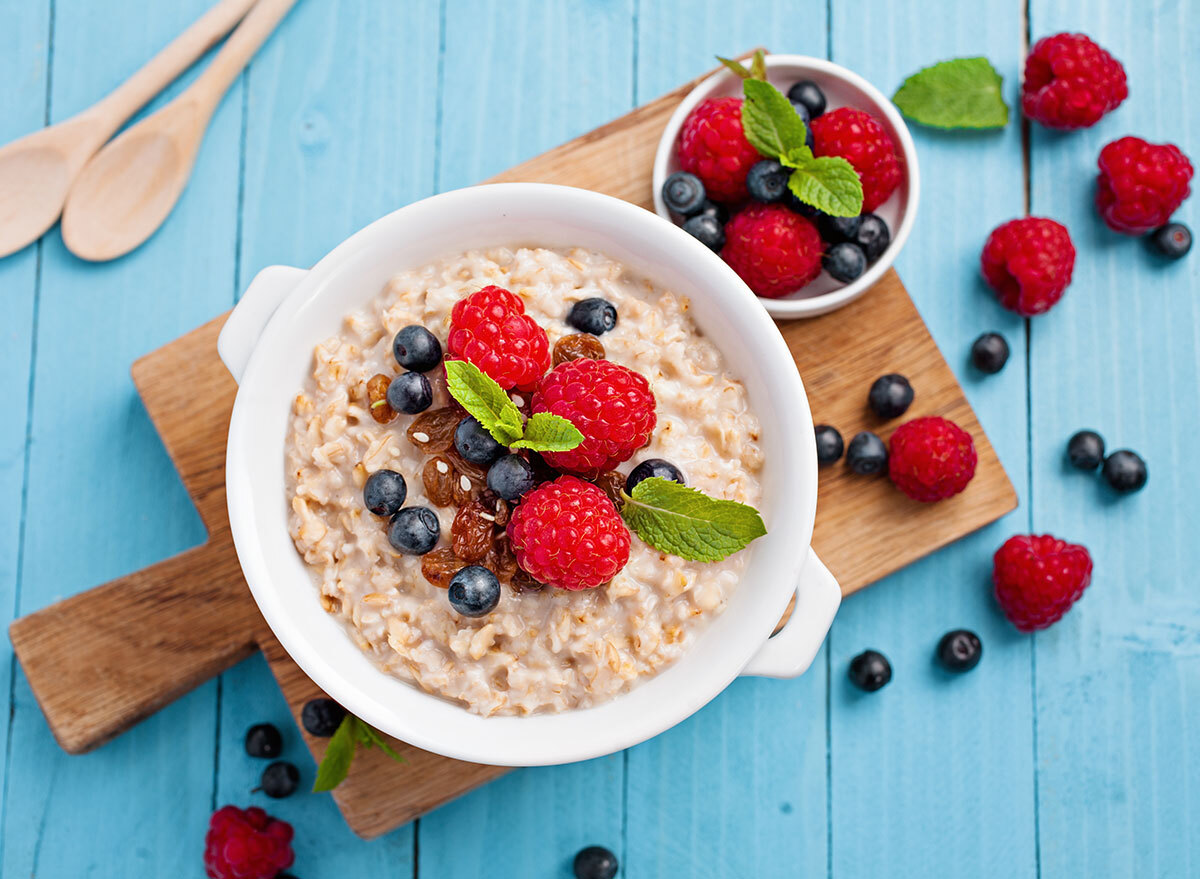 oatmeal with berries in a white bowl