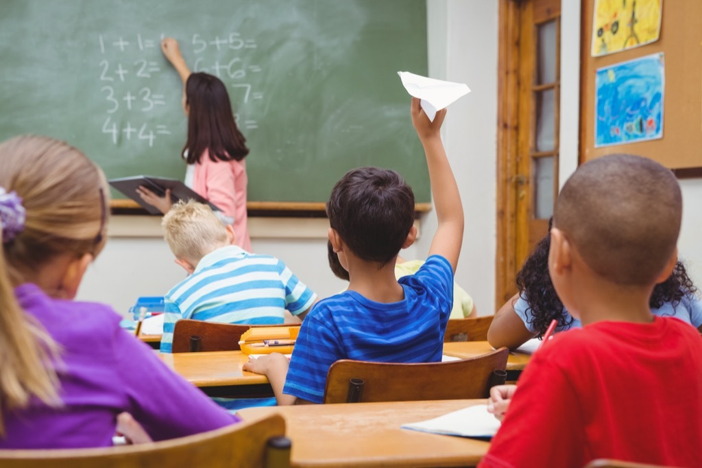 boy throwing paper airplane, things you should never say to a teacher