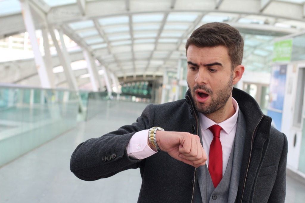 man arriving late to work