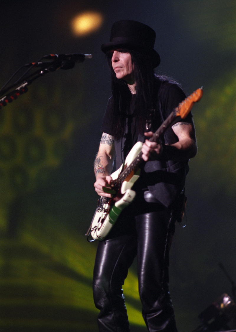 Mick Mars performing in Denver in 1997