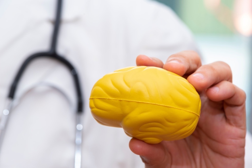 doctor holding a brain