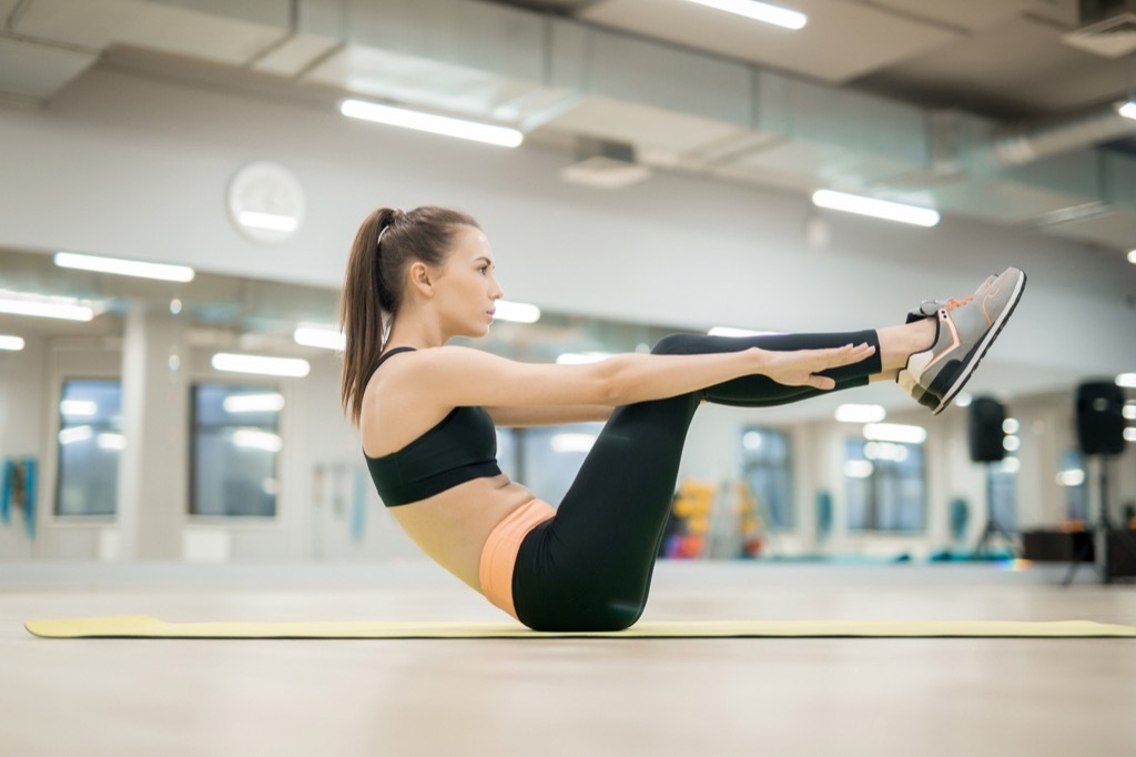 Woman Doing Sit Up Ab Workouts