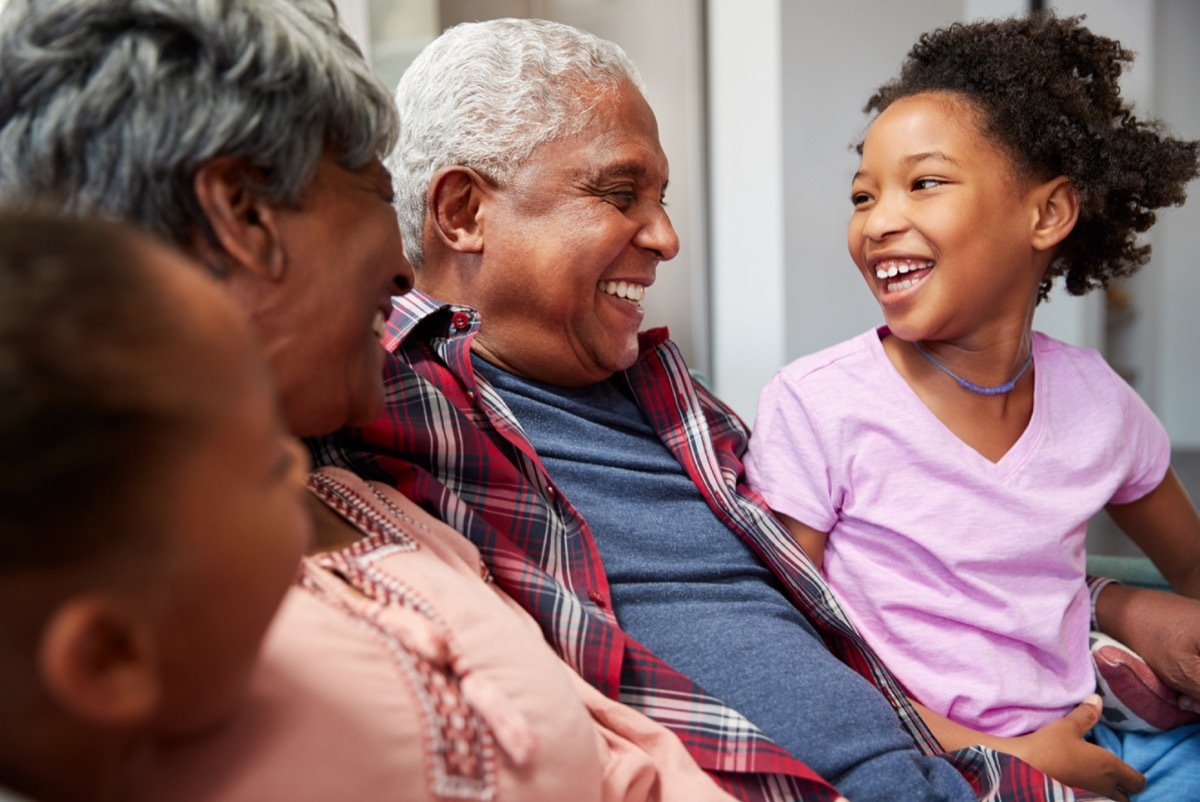 Grandparents talking with grandchildren