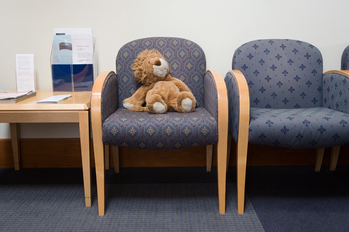 chairs and toy lion in doctors waiting room