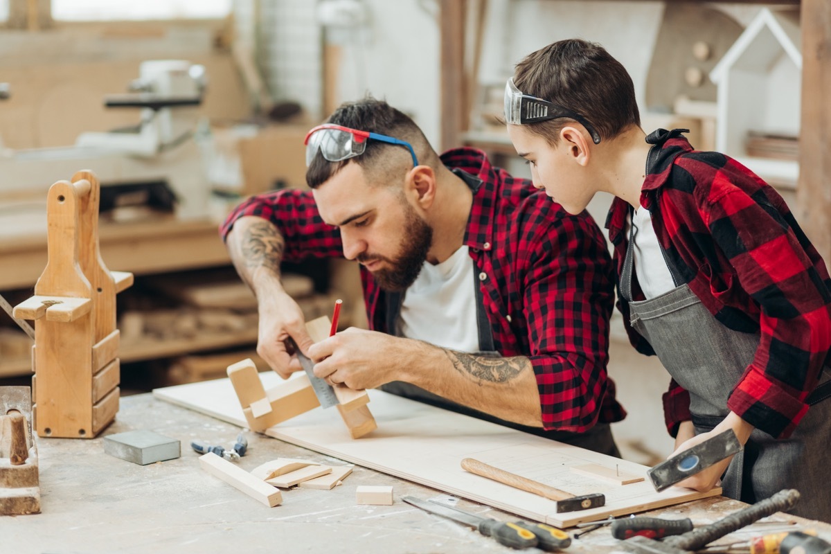 Father son woodworking together