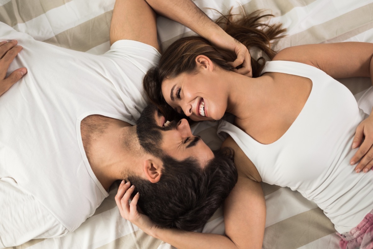 Couple Being Playful in Bed