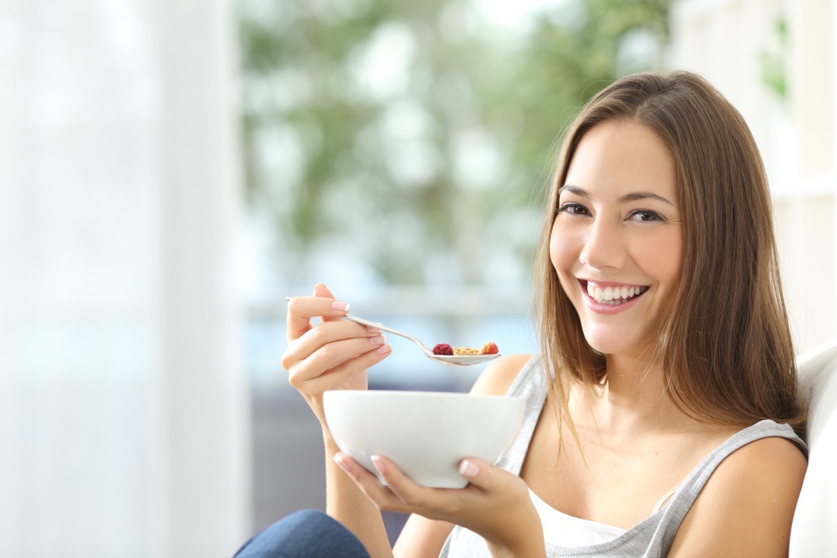 Woman eating cereal