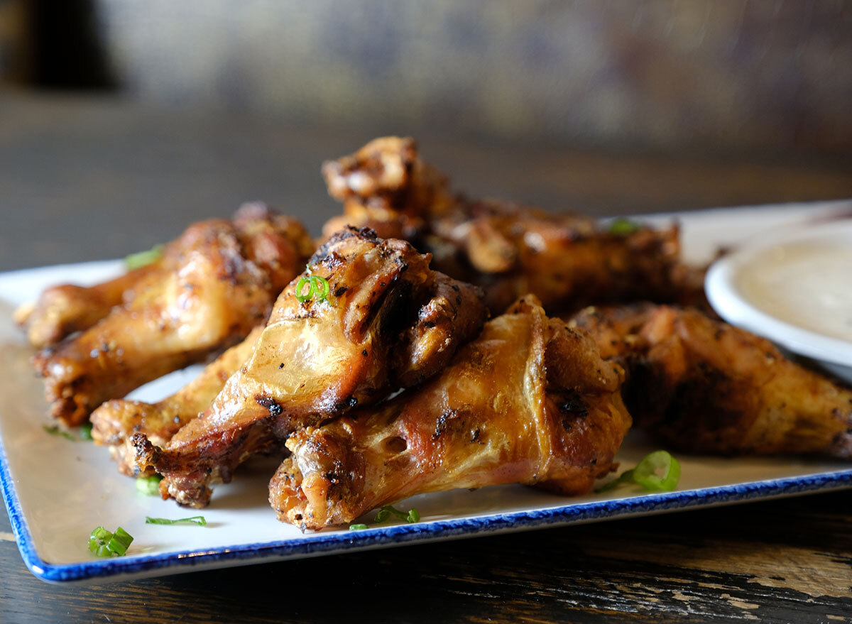 plate of chicken wings with ranch dip