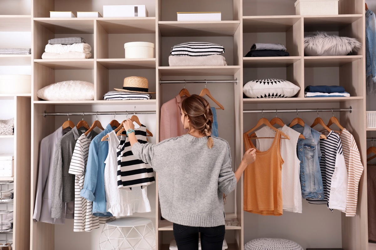 Woman looking in her closet