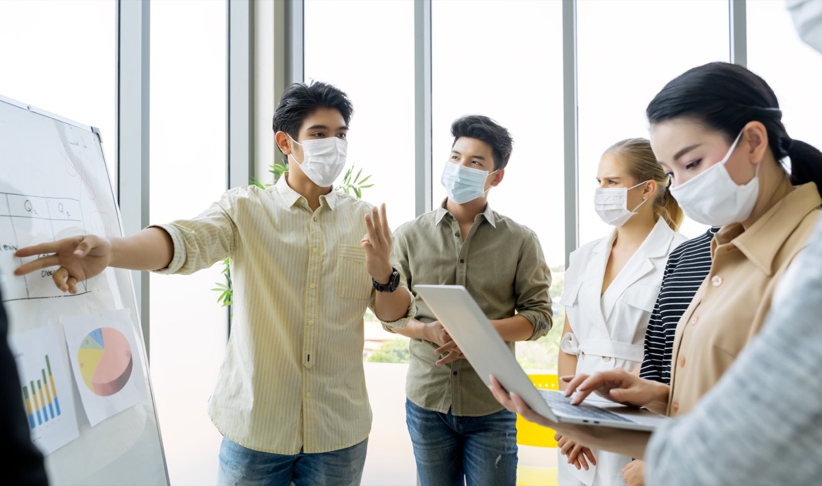 People wearing masks at work