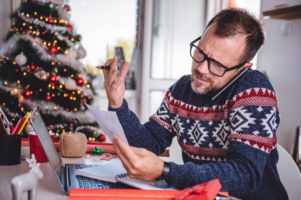 man looking at paperwork advice you should ignore over 40