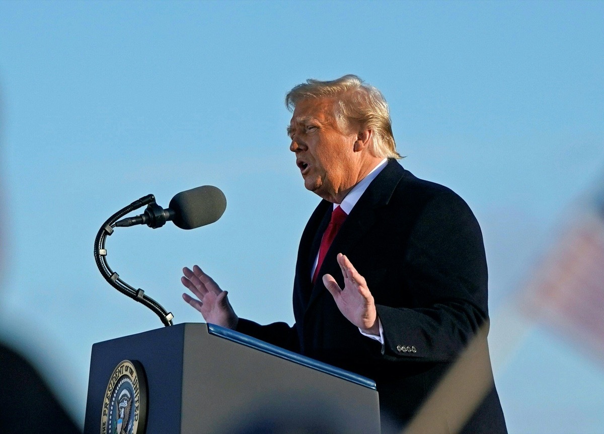 donald trump standing at podium delivering speech