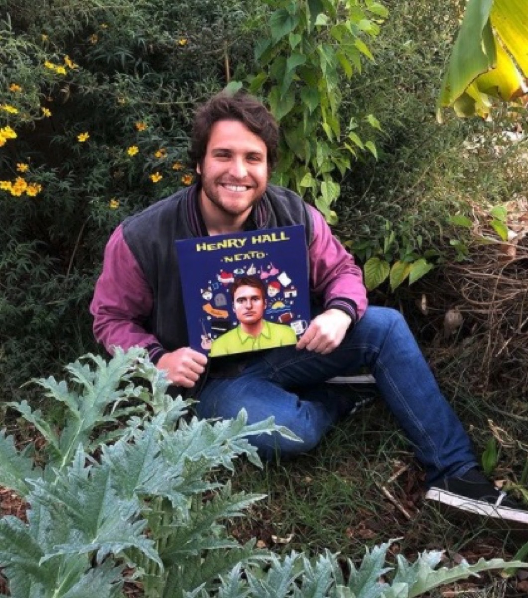 Henry Hall holding his album on Instagram