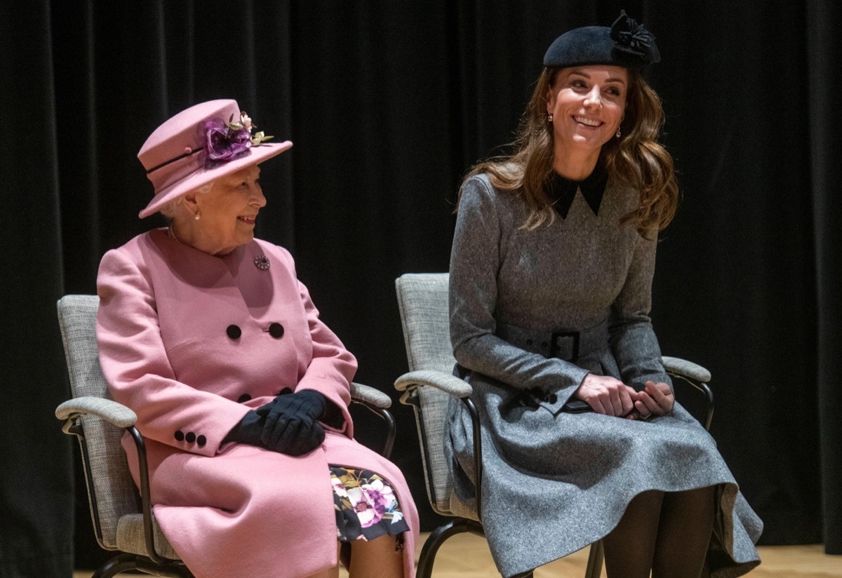 Queen Elizabeth and Kate Middleton at Kings College on stage