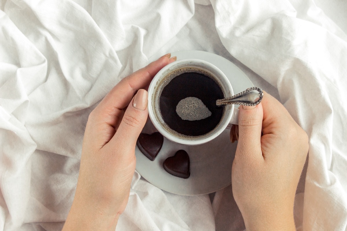 Person Drinking Black Coffee