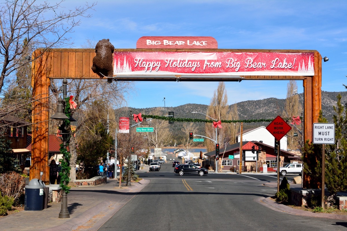 A banner saying happy holidays in a small town. 