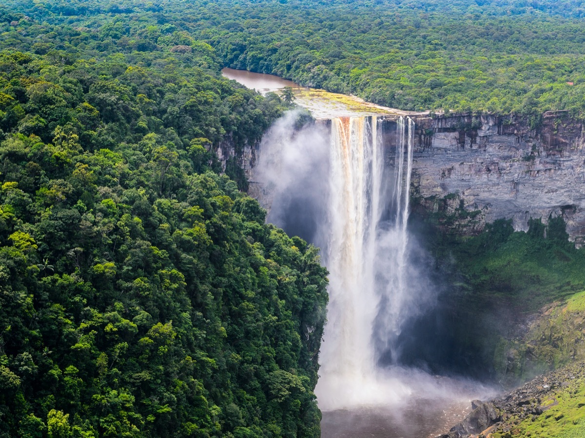 waterfall in lush rainforest in guyana