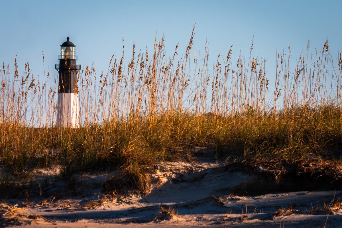 Tybee Island Lighthouse on the Atlantic Ocean in Georgia at sunset - horizontal