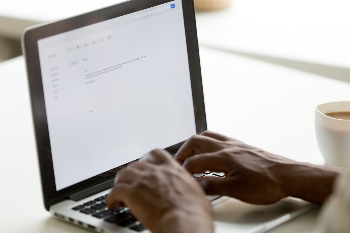 Man writing an email