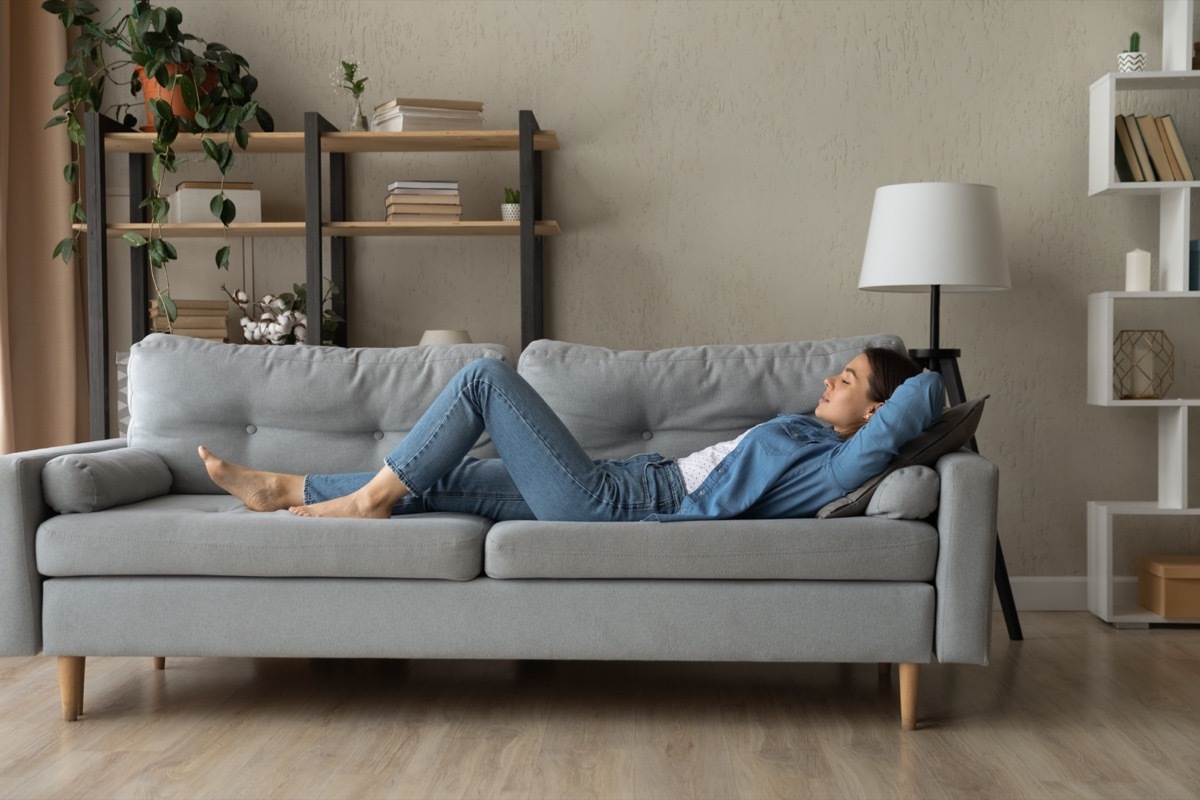 Person Recharging on Sofa