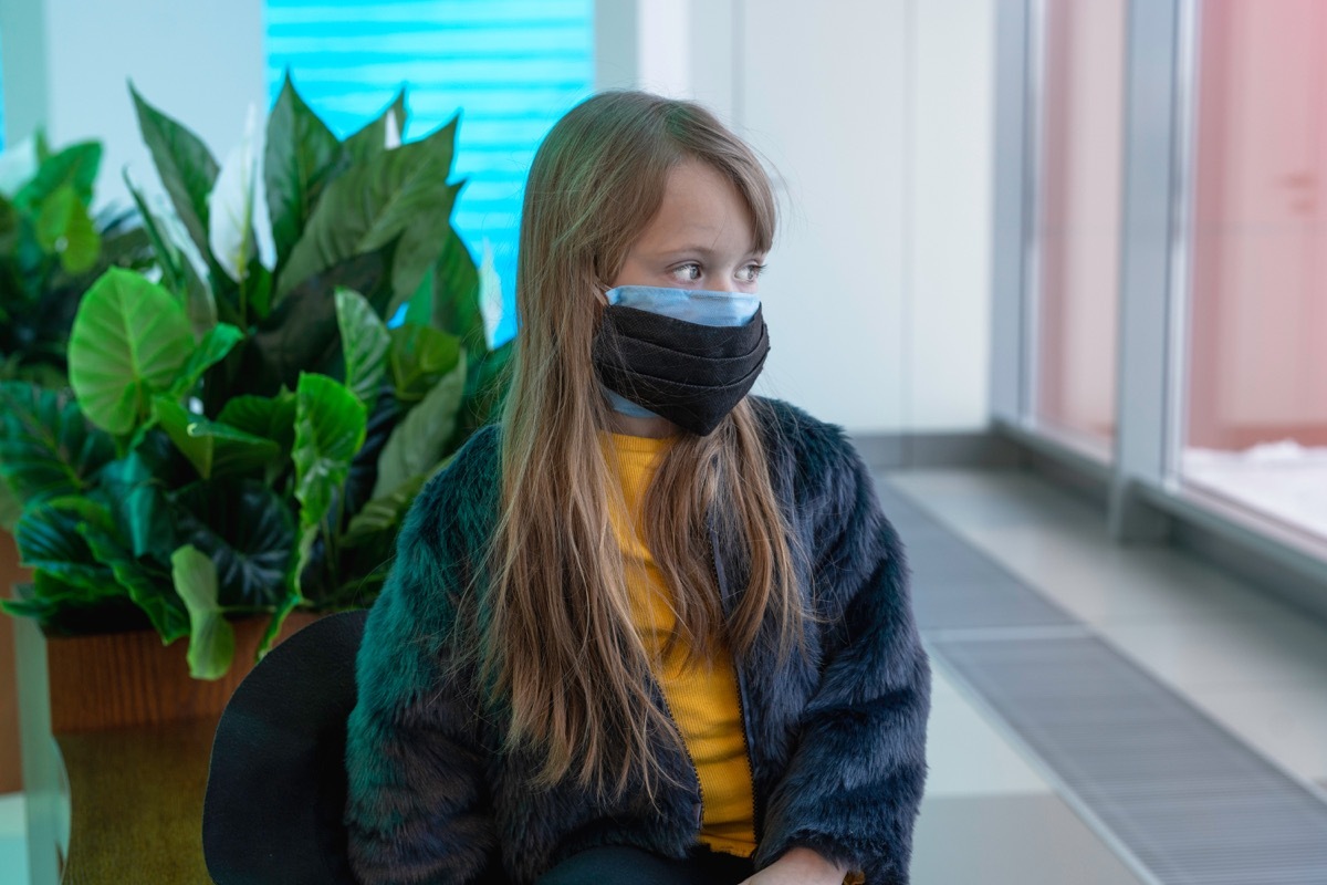 Girl wearing two masks