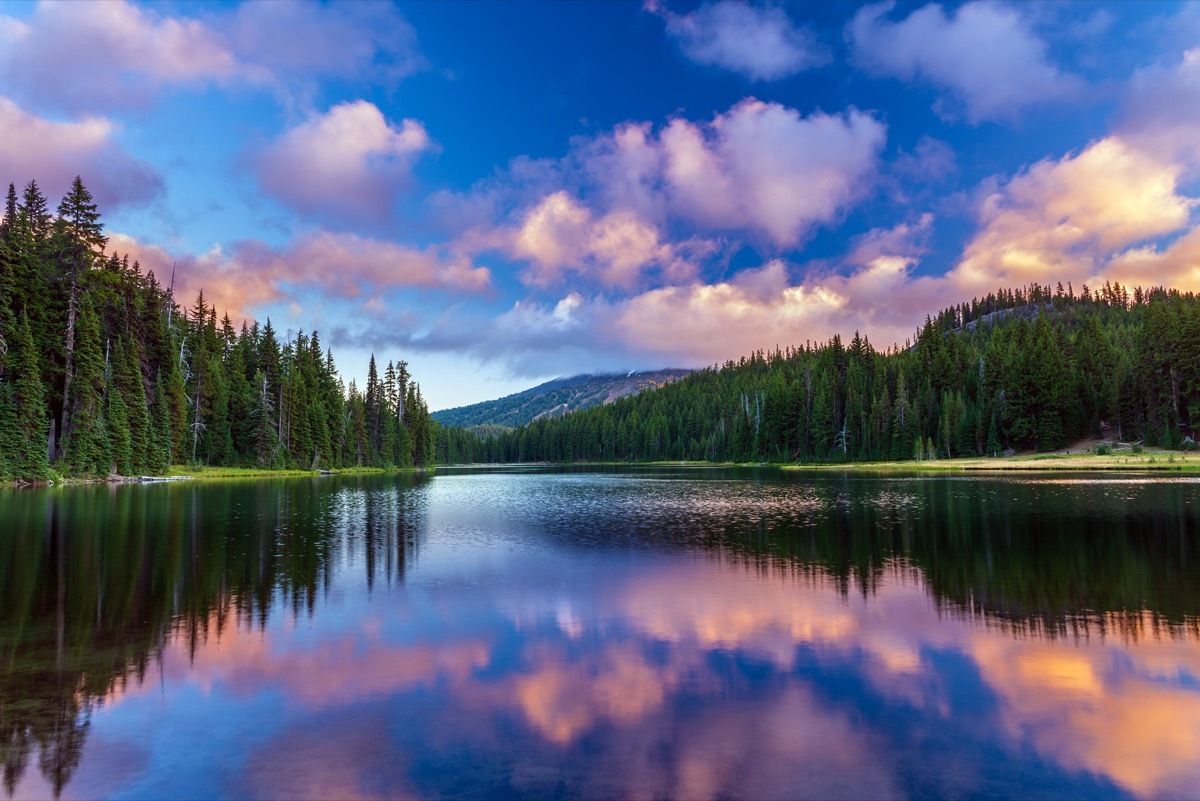 landscape photo of Mt. Bachelor reflecting in Todd Lake in Bend, Oregon at dusk