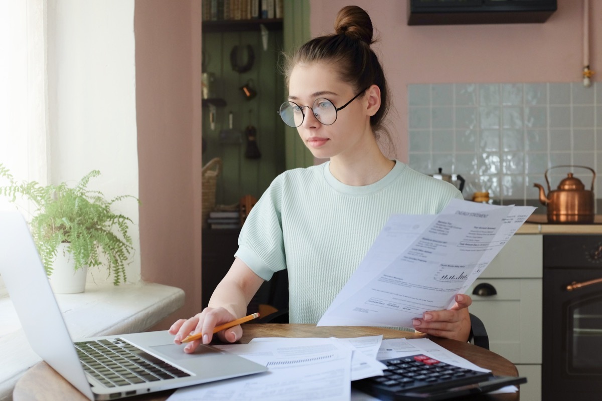 woman paying cable bill