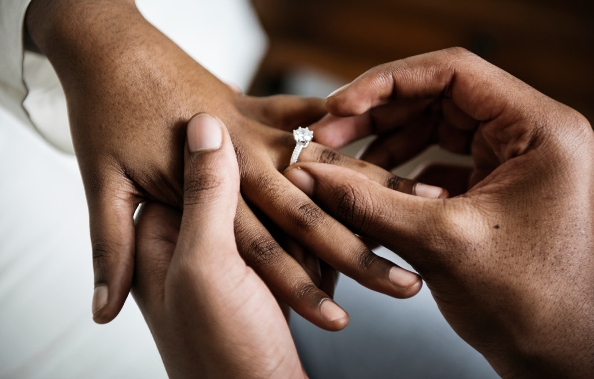 girl getting proposed to with engagement ring