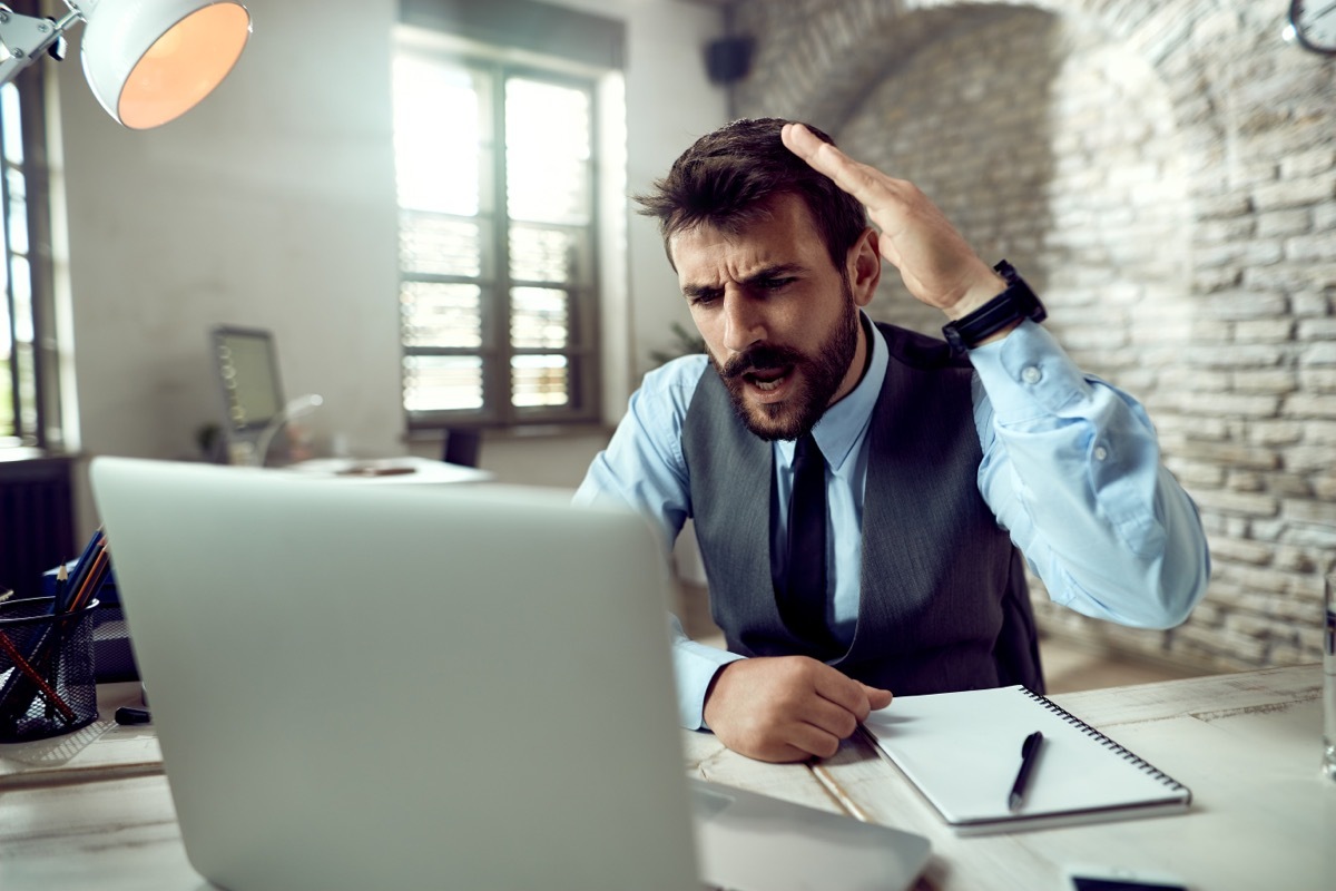 Man Freaking Out at Computer