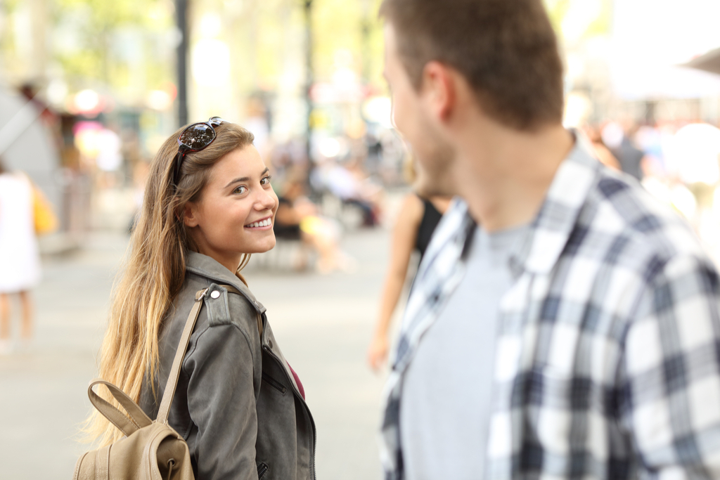 Girl Smiling at Stranger