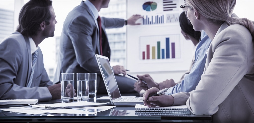 man giving presentation ways to get a promotion after 40