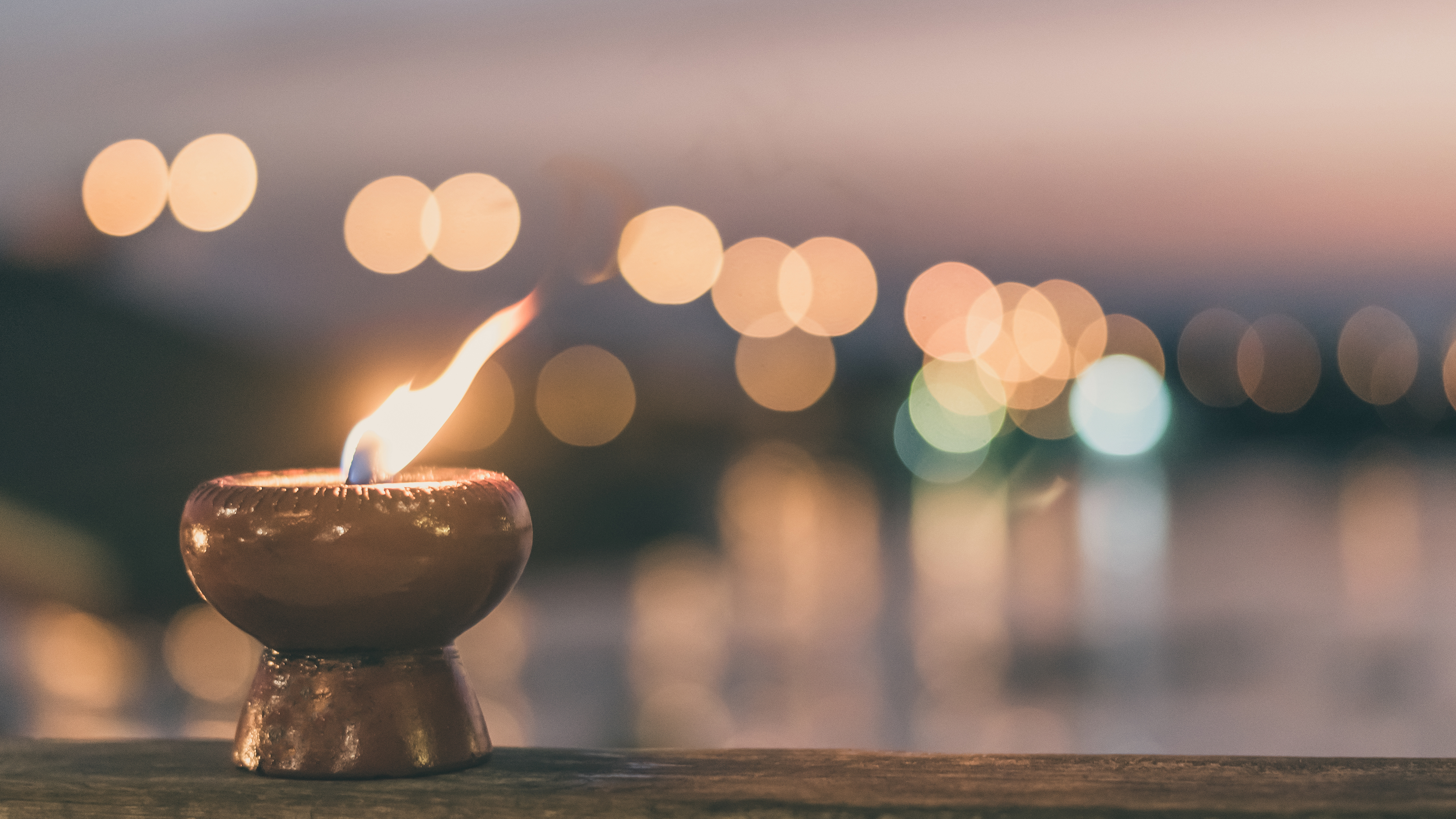 candle burning in a church