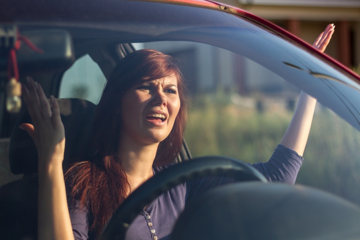 Woman with road rage yelling at other drivers