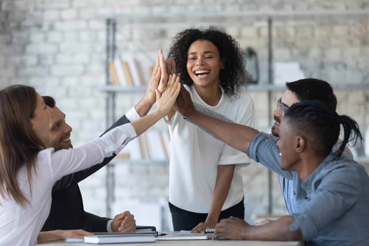 Co-Workers High Fiving