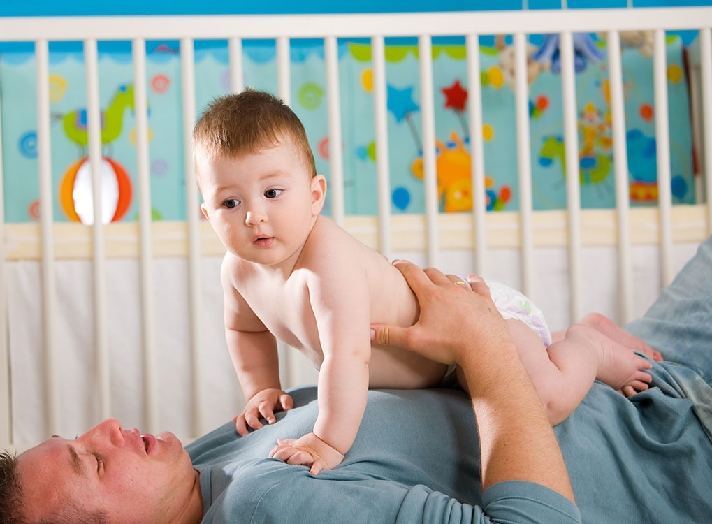 Man holding baby