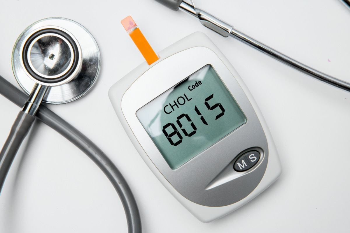 medical device for measuring cholesterol with stethoscope on the table.