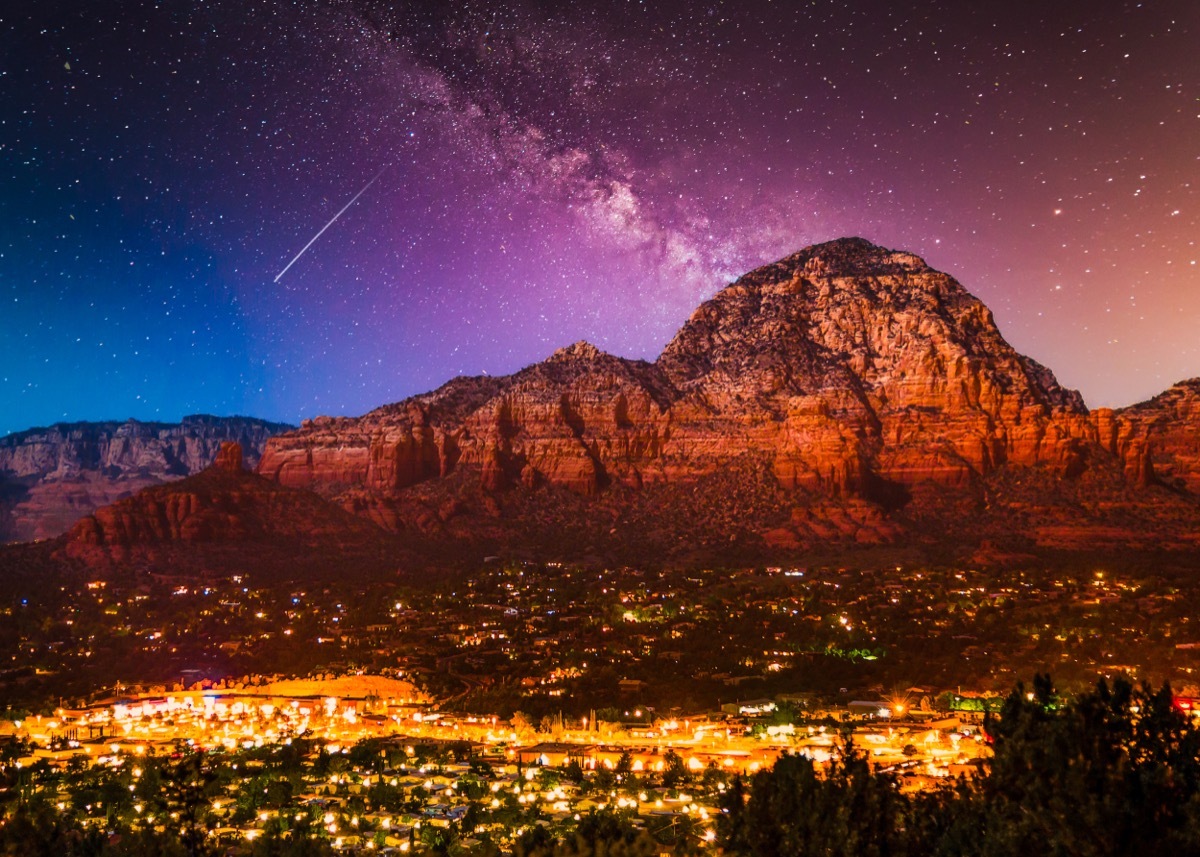 milky way over sedona arizona city lights