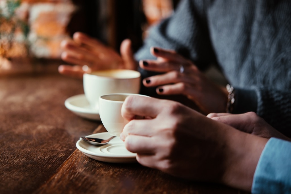 conversationalist people talking over coffee Things You Should Always Do at a Fancy Restaurant